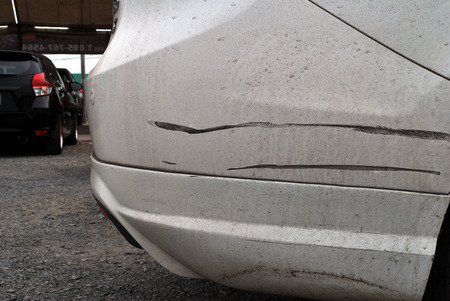 Scratches and black stains on carsの写真素材