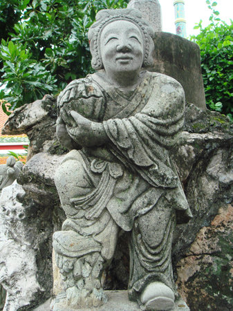 Face of marble Child Carving in the gardenの写真素材