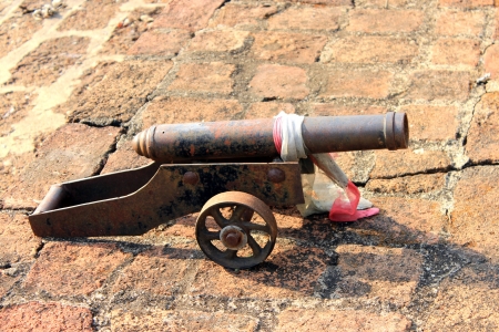 Antique cannon isolated, thajlandの写真素材