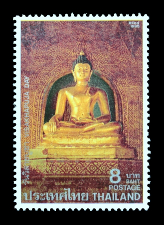THAILAND - CIRCA MAY 1995  A postage stamp printed in Thailand shows image of pay homage to Lord Buddha and to publicize the important Buddhist Religious Day  Visakhapuja Day , circa May 1995のeditorial素材