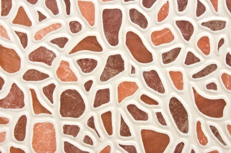 Colored square tiles that form a brown stone.の写真素材