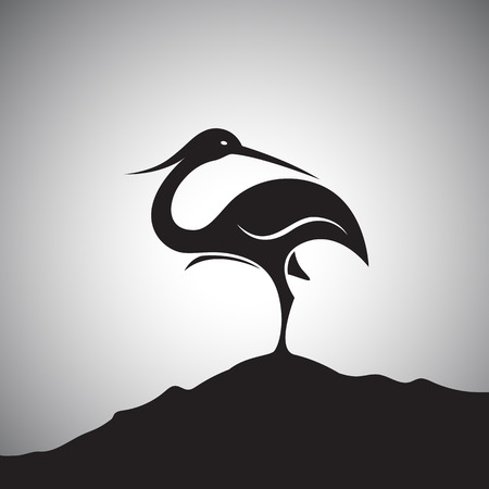Vector image of an stork standing on the rocks.のイラスト素材