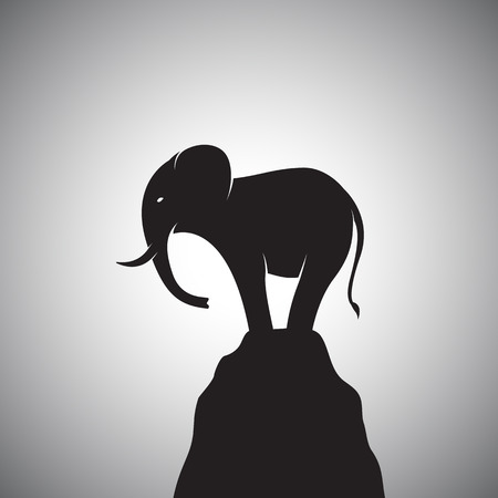 image of a elephant standing on the rocks.のイラスト素材