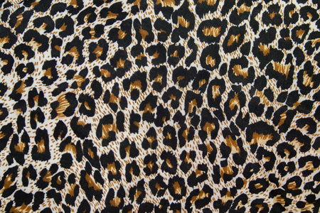 Leopard pattern texture. Textile, piece of clothes.