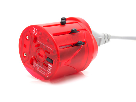 world travel adapter on whiteの写真素材