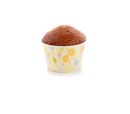 banana muffin cupcake on white backgroundの写真素材