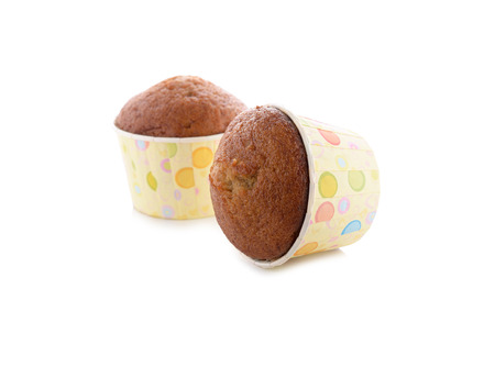 banana muffin cupcake on white backgroundの写真素材