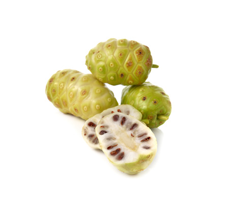 fresh noni fruit on white backgroundの写真素材