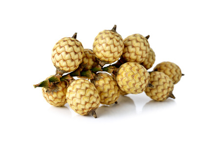 bunch of rattan fruits on white backgroundの写真素材