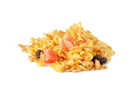 heap of cereal mix with dried papaya, raisin, apple, peach on white background