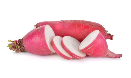 whole and cut fresh radish on white backgroundの写真素材