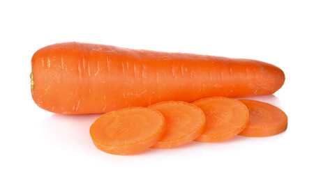 whole and sliced fresh carrot on white backgroundの写真素材