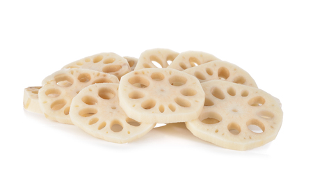 pile of sliced lotus root on white backgroundの写真素材