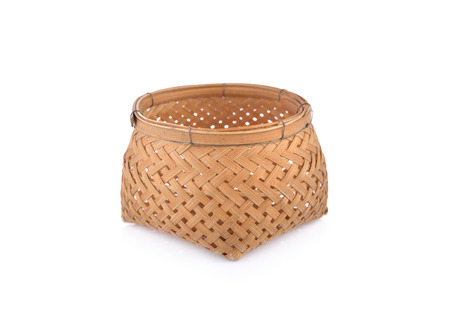 empty bamboo basket on white backgroundの写真素材