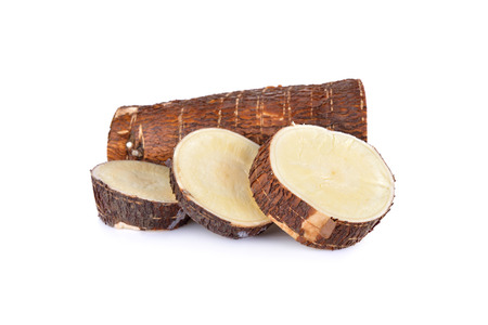 raw cassava isolated on white backgroundの写真素材