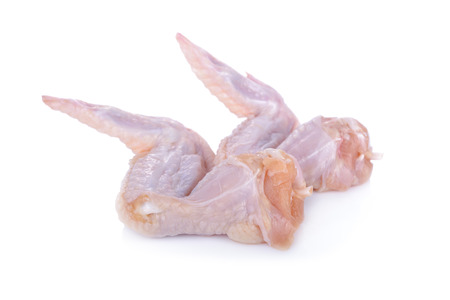 raw chicken wings on white backgroundの写真素材