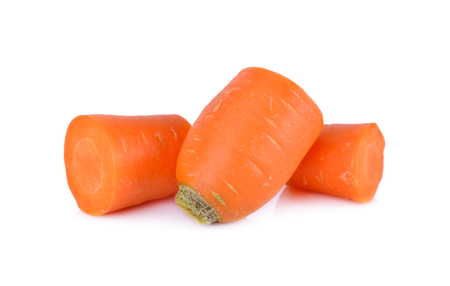 portion cut fresh carrot on white backgroundの写真素材