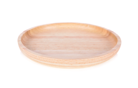 empty wooden plate on white backgroundの写真素材
