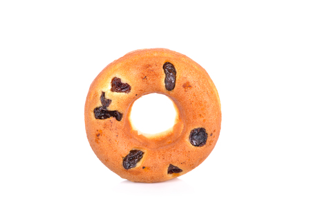 donut cake with raisin on white backgroundの写真素材