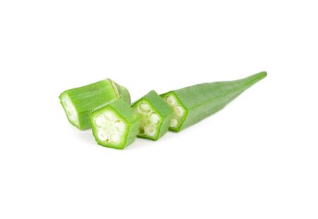 uncooked portion cut fresh okra on white backgroundの写真素材