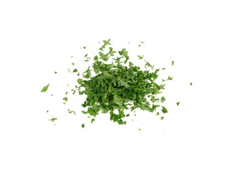 pile of chop fresh  parsley on white backgroundの写真素材