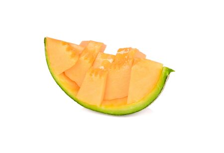 portion cut ripe muskmelon on white backgroundの写真素材