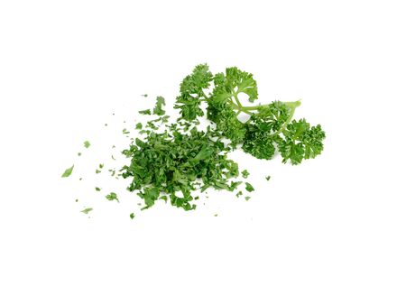 pile of chop fresh  parsley and branch parsley on white backgroundの写真素材