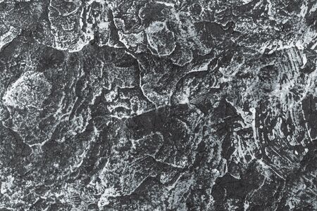 Black textured rice paper with the imprint of the texture of the stone. Neutral textured background....