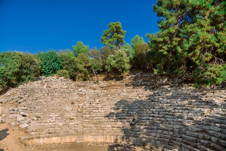 Greek Roman theatre in Phaselis, Antalya, Turkey. Ruins of ampitheatre at Phaselis, Lycian way, Turkey. Ancient ruins in antique town Phaselis, Turkey.の写真素材