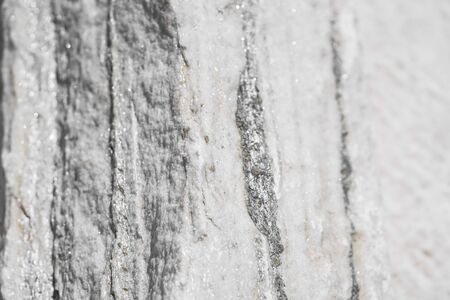 Grey travertine marble, rock surface background. texture of granite background. Natural rough surface white granite texture. Natural pattern.の写真素材