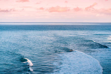 Powerful ocean waves in Bali. Aerial photography. The surface of the ocean off the coast of the...