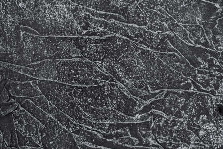 Black rice paper. Folds and texture of rice paper. A hand-made paper