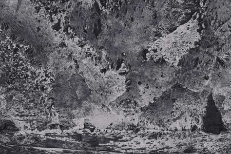 Texture of black rice paper with white streaks on it. Rice paper with creases cracks and spots....