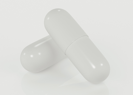 White capsules isolated on white , healthcare concept.の写真素材