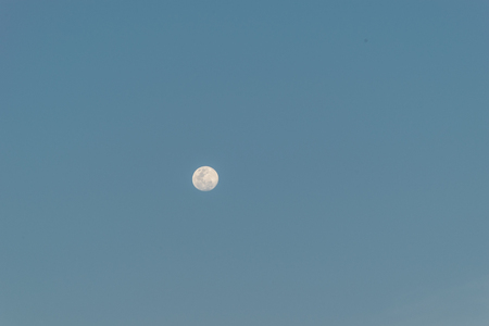 Full moon in the blue sky, clear daysの写真素材