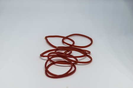 rubber band is isolated, white backgroundの写真素材