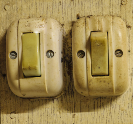 switch old plug is close up image, wooden backgroundの写真素材