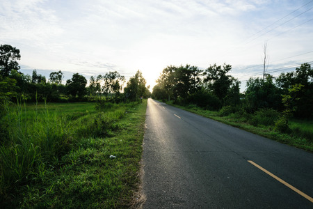 road in countryside is beautiful transport for car and have green tree or green plant in side of road,thailandの写真素材