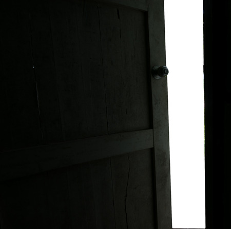 Opening the wooden door For something betterの写真素材