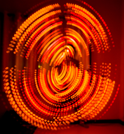 Several lines of light colored lines, beautiful and hurts is an interesting and exciting luai wire. There is a black or dark background, suitable for use as a backdrop.の写真素材