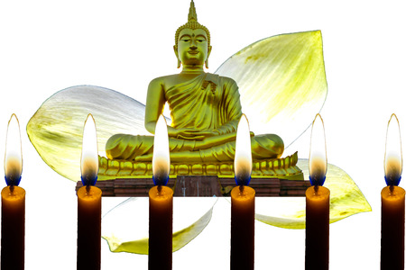 Buddha  with moon white background,and lighting of candle in front of imageの写真素材