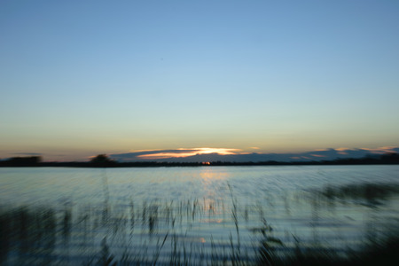 Sunset background,sunlight reflecting in the river ,beautiful landscape,view in the evening conceptionの写真素材