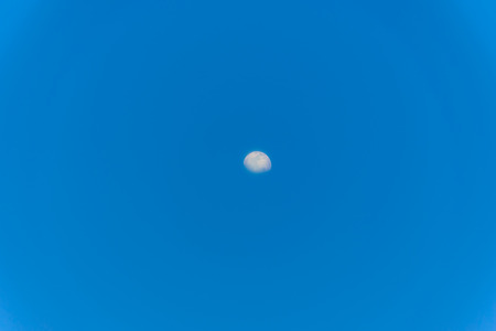 Moon with blue sky ,crescent and ramadan background, clear day and clear sky , texture background.の写真素材