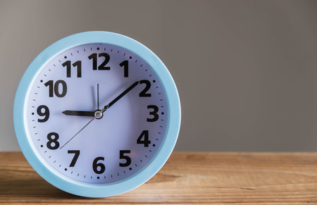 Clock on woodenの写真素材