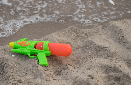 Water gun on baechの写真素材