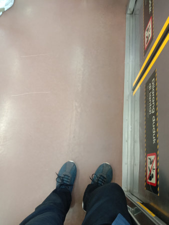 Selfie of man legs in subway train station, travel concept.