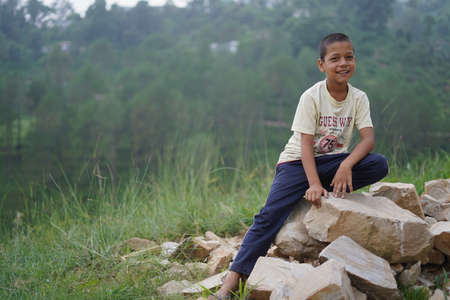 ALMORA, INDIA - SEPTEMBER 06, 2020: Portrait of a pahadi boy with tilak on his forehead. Fun and happy concept.のeditorial素材