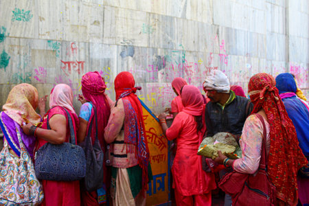 Mathura, Uttar Pradesh, India- January 6 2020: women of india praying to the god, standing in a line during the celebration of holi in mathura.のeditorial素材