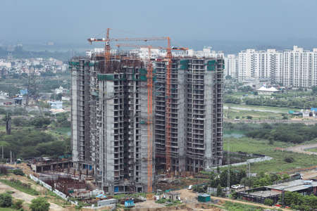 aerial view of New Building construction in Dwarka Expressway, construction of a building with cranes.の写真素材