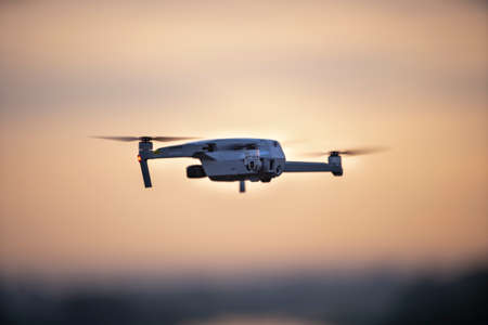 Delhi, New Delhi, India, September 6 2021: A DJI mavic Air 2 flying in the sky during sunrise.のeditorial素材
